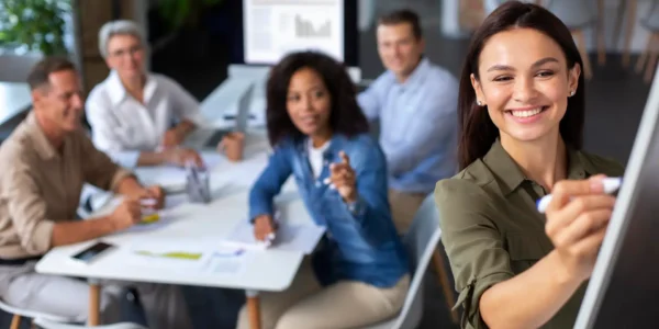 people-using-digital-device-while-meeting