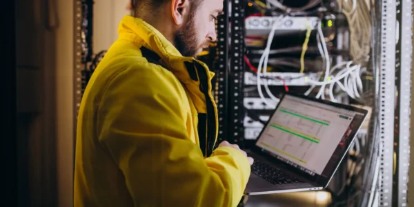 Young man engineer making program analyses